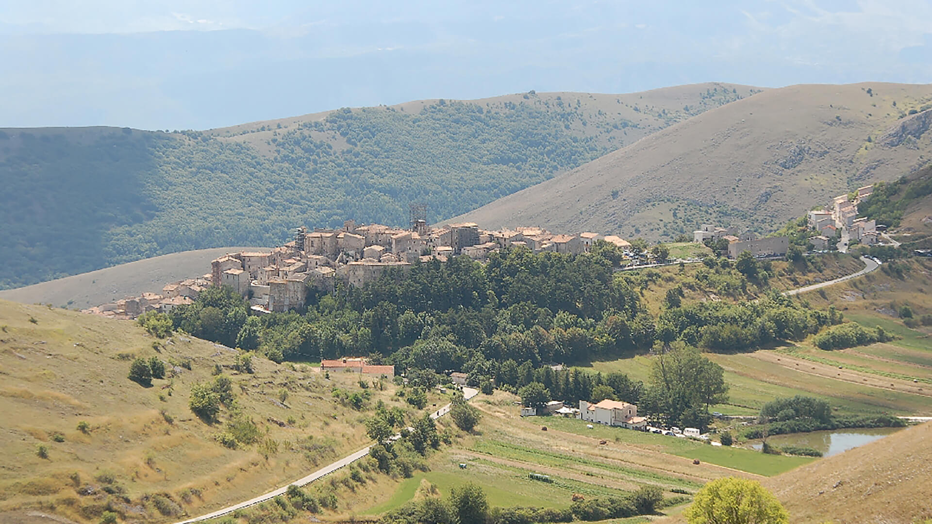 View of the village in summer with the lake